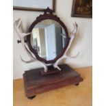 A 19th Century Mahogany Crutch Mirror with antler superstructure. 58 x H77cm approx.