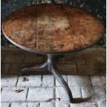 A Provincial 18th Century Oak circular Table. H69 x Diam.75cm approx.