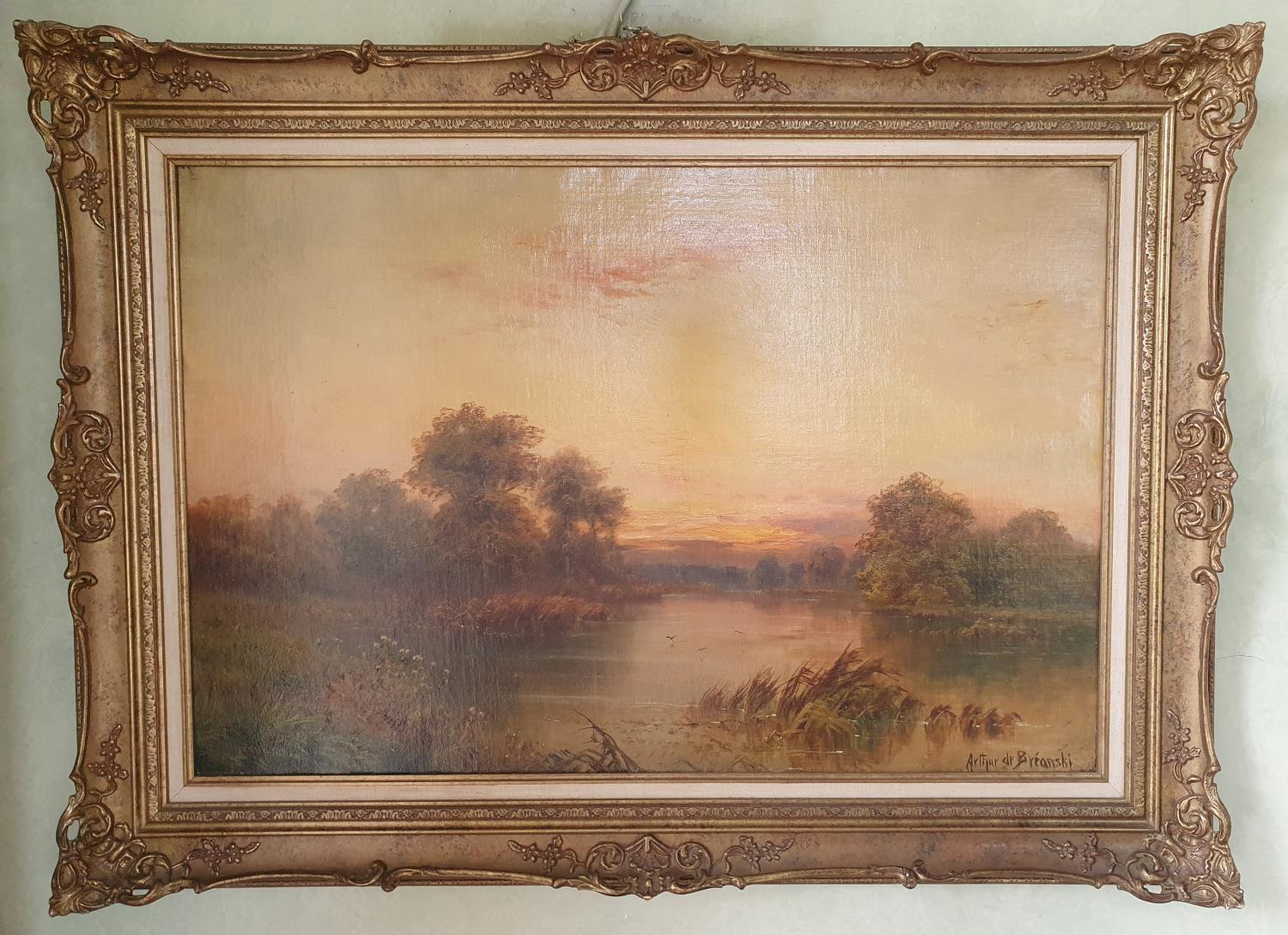Arthur De Breanski. An Oil on Canvas of a sunset river landscape. Signed LR. 51 x 76cm approx.