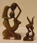 Zwei erotische Holzschnitzereien