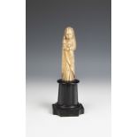 Indo-Portuguese school, ca.1600. "Virgin and Child. Carved ivory. Rear pedestal. Measurements: 12 cm