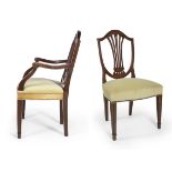 Menorcan Hepplewhite style chairs, ca.1790. 2 armchairs and 10 chairs. Walnut wood. Measurements: 94