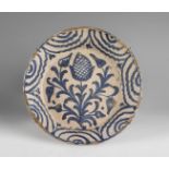 Dish from the Opium Poppy Series. Talavera de la Reina, 18th century. Glazed ceramic.