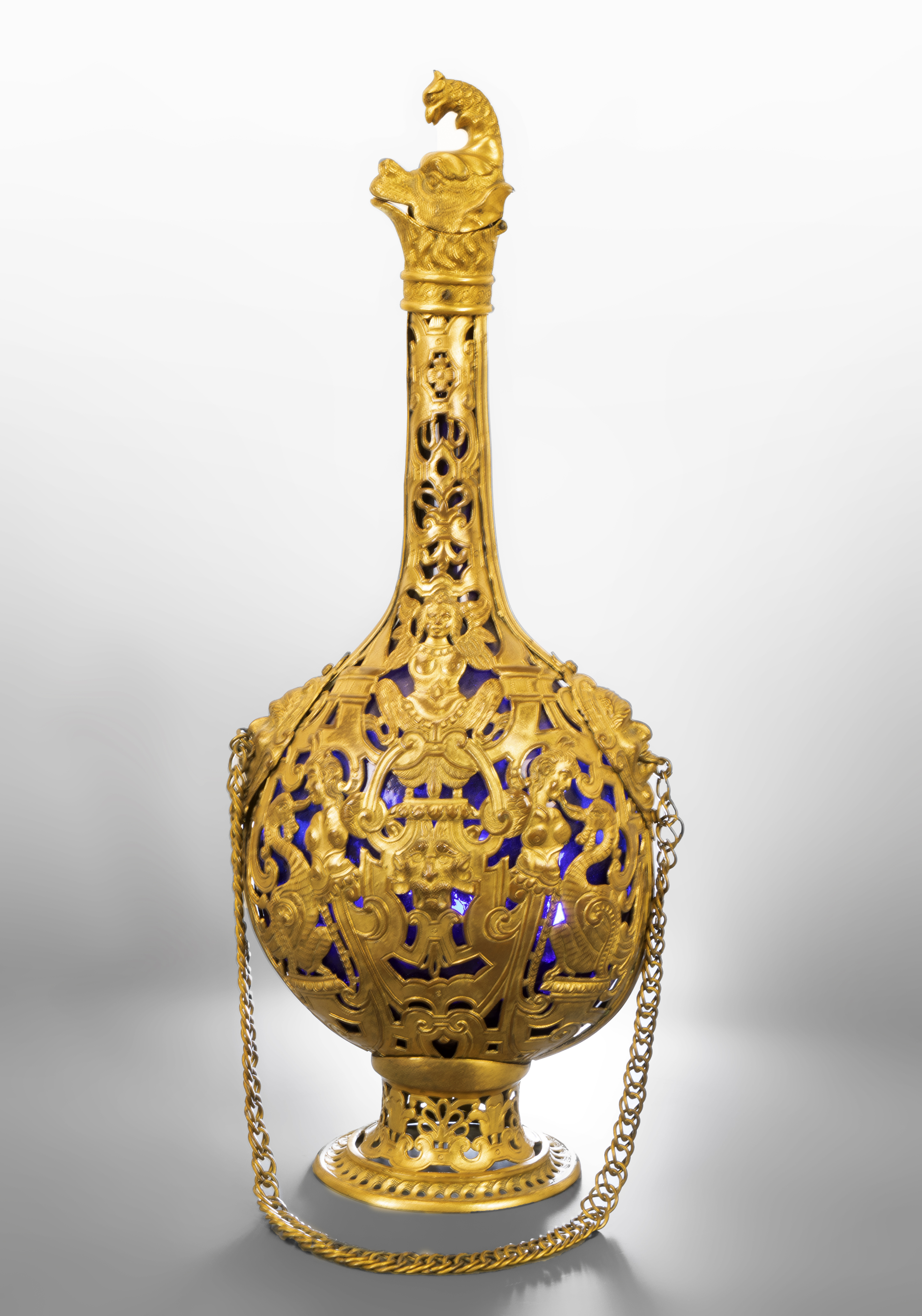 Pilgrim's flask. Italy, XIX century. Glass and gilded bronze. Measurements: 45 cm (height).