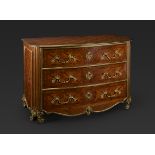 French Regency style chest of drawers, 20th century. Walnut wood, marquetry and bronze.