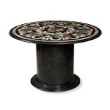 Italian table, s.XIX. In black marble, hard stones and mother-of-pearl. Measurements: 71,5 x 121 x