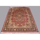 Oriental rug; 21st century. Silk and cotton. 800,000-900,000 knots per m2. It shows slight traces of