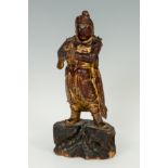 Warrior; China, XVIII century. Carved and lacquered wood. Remains of gilding. Measurements: 27 x