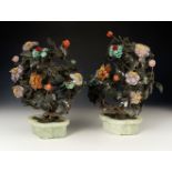 Pair of planters. China, pps. s.XX. In jade, hard stone flowers. Measurements: 35 x 25 x 20 cm. Pair