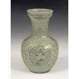 Celadon vase. China, late 19th century-early 20th century. Celadon glazed ceramic. With seal on