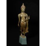 Walking Buddha figure; Thailand, Sukhothai Period, XIV-XV centuries. Bronze with traces of
