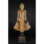 Thai school, mid-twentieth century. "Buddha". Lacquered wood, gilded and with mirror glass