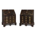 Pair of colonial Bureaus; mid 18th century. Lacquered wood. They have repainted lids and missing