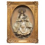 Virgin of dress of the XVIII century. Modeled wax. Cloth vestments. Eighteenth century frame in
