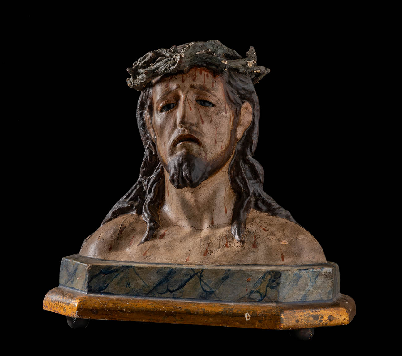 Bust of Christ; Andalusian School; late seventeenth century. Plaster wood, glued cloth, and eyes