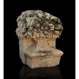 Copete with vase motif; Andalusia, XVIII century. Sandstone. Measurements: 50 x 38 x 35 cm. Made