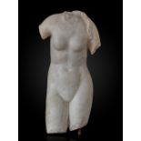 Torso of Venus pudica. Roman Empire, 2nd century A.D. Marble. Revolving marble pedestal. Measures: