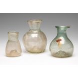 Set of three ointments. Rome, II-IV centuries. Glass. Measurements: 5.5 cm, 8 cm and 6.5 cm. The use