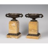 Pair of glasses "Grand Tour"; Restoration period, nineteenth century. Siena marble and bronze.