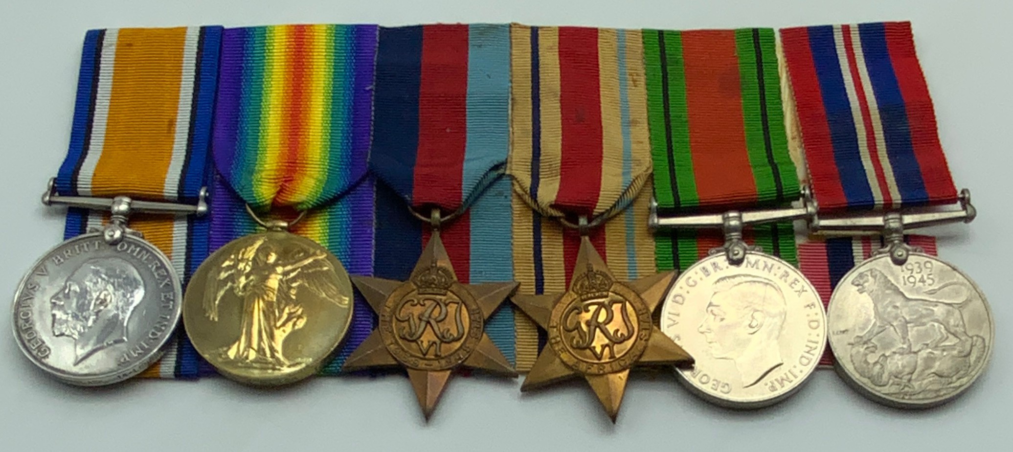 WWI AND WWII GROUP OF SIX MEDALS SOME AWARDED TO 515671 PTE.L.A.G. BLACK. 14-LON.R