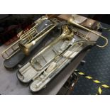 FOUR BRASS INSTRUMENTS