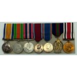 WWI & WWII GROUP OF 7 MEDALS INCLUDING HALLMARKED SILVER OFFICERS ROYAL NAVY VOLUNTEER RESERVE MEDAL