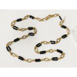 21 CT & BLACK BEADED NECKLACE