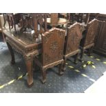 HAND CARVED ORIENTAL TABLE & EIGHT CHAIRS