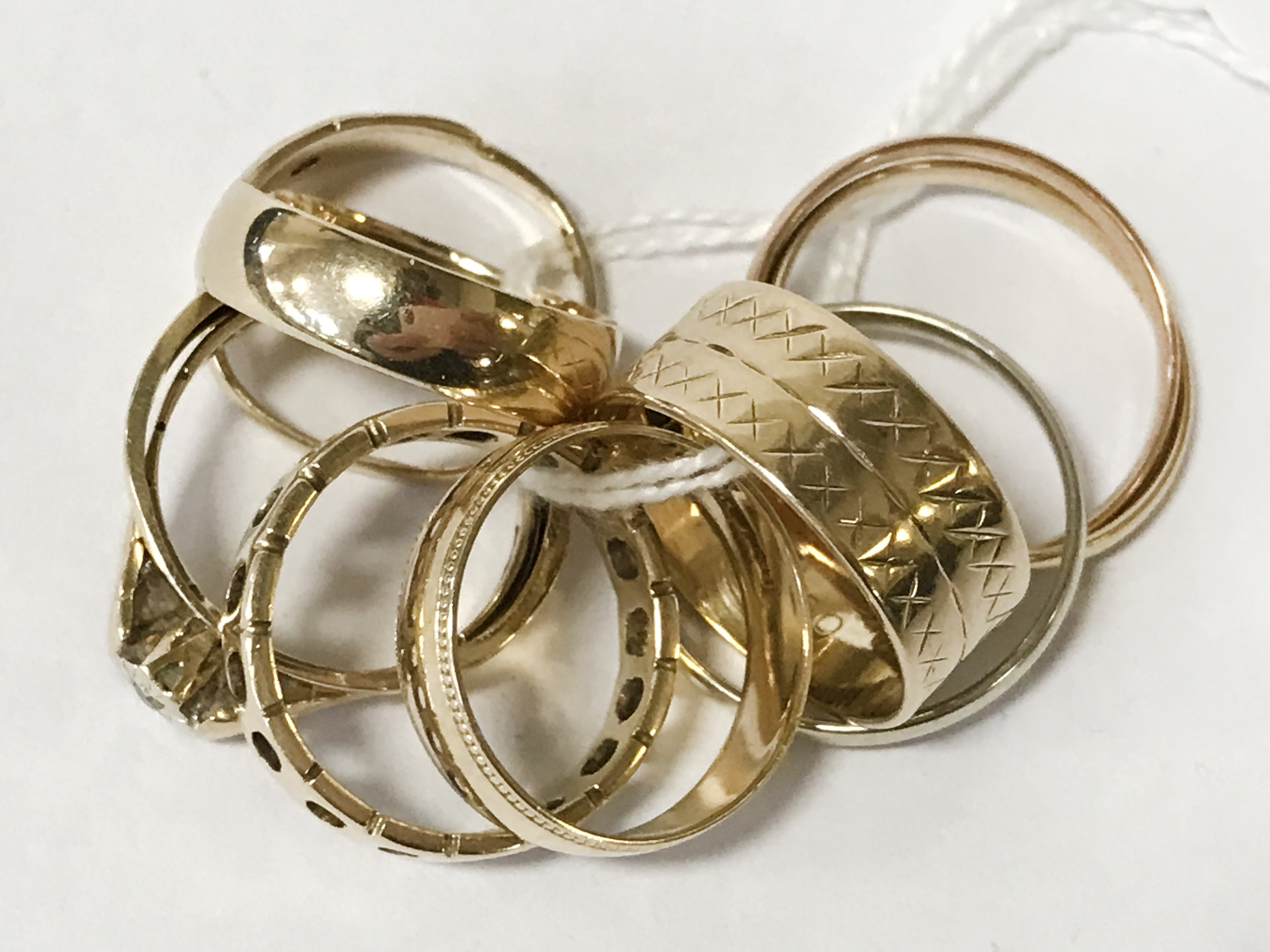 EIGHT 9CT GOLD RINGS