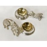 TWO SILVER PLATE DOG SALTS