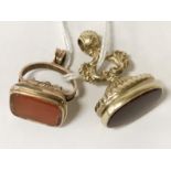 TWO 9CT GOLD AGATE FOBS