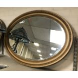 TWO OVAL MIRRORS