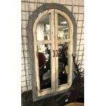 GREY ARCH SHUTTER MIRROR - HEIGHT 40CM, WIDTH 53CM, DEPTH 3.5CM - MIRROR HAS A FEW MINOR SURFACE SCR