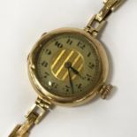 18CT GOLD LADIES WATCH