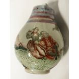 A SMALL 18TH CENTURY CHINESE EXPORT WARE JUG DEPICTING A RARE EROTIC SCENE - 10CMS