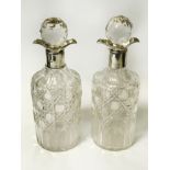 PAIR OF HM SILVER COLLARED DECANTERS