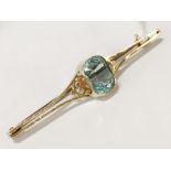 9CT GOLD BLUE GEMSTONE BROOCH