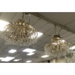 TWO BRASS & CRYSTAL CHANDELIERS & 3 WALL LIGHTS