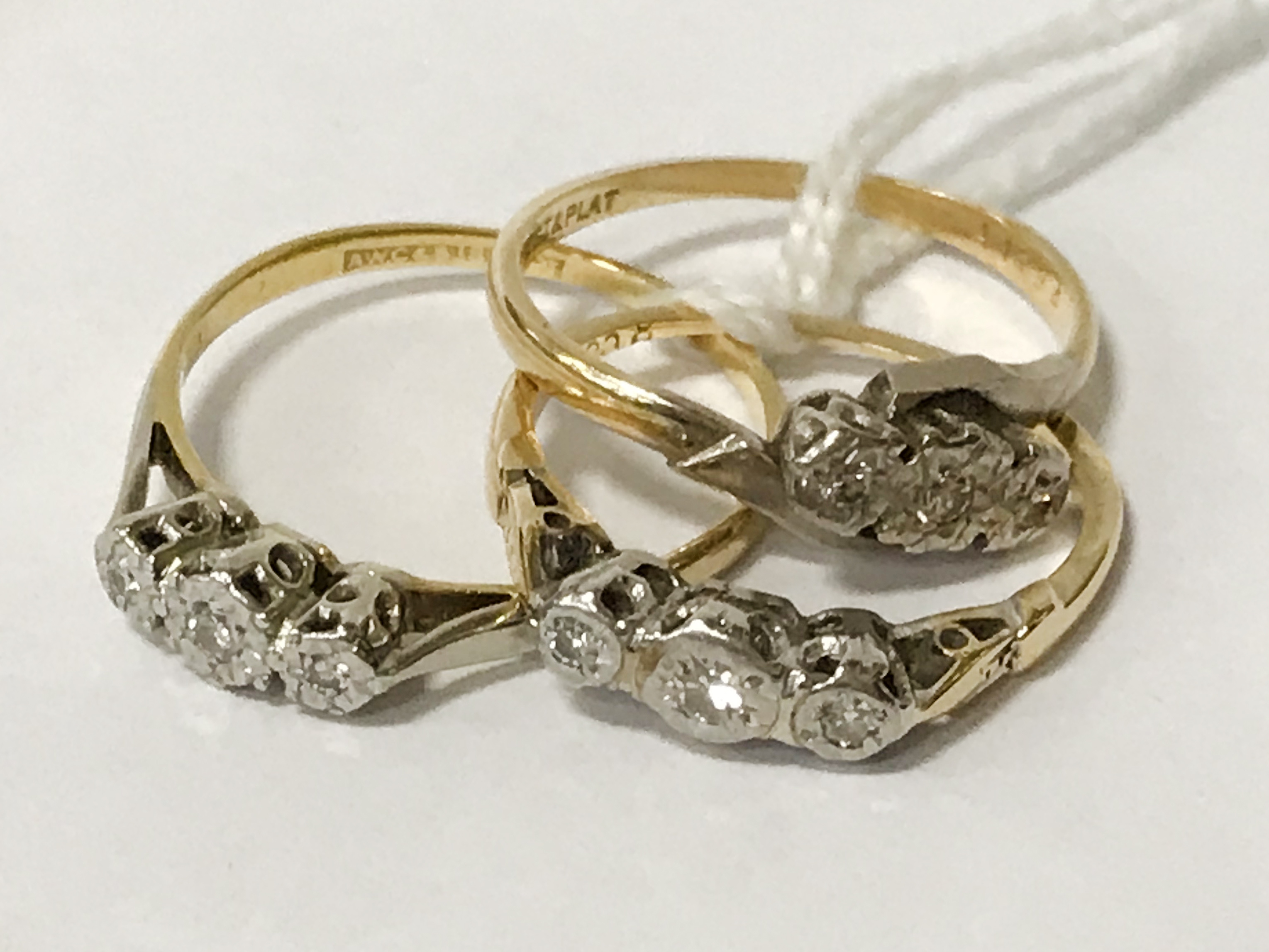 THREE 18CT GOLD RINGS WITH DIAMONDS