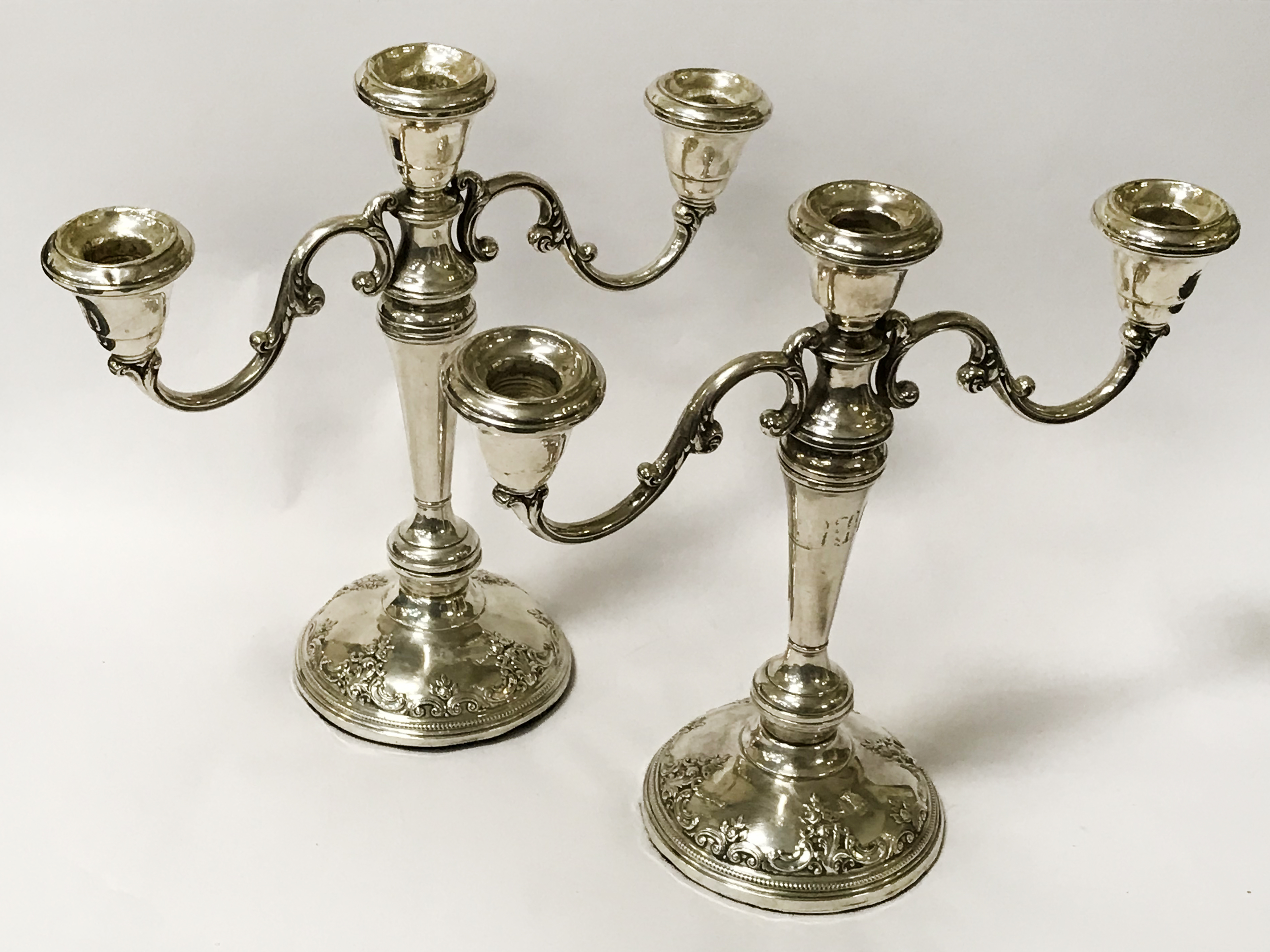 PAIR SILVER EMBOSSED CANDELABRA - 28CMS