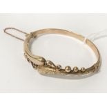 9CT GOLD BANGLE 9.3 GRAMS