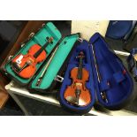 TWO 1/4 SIZE CASED VIOLINS