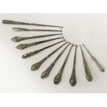 COLLECTION OF EARLY BUTTON HOOKS - MOSTLY SILVER