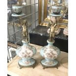 PAIR BRONZE & PORCELAIN CHERUB CANDLESTICKS - 36 CMS