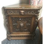 CARVED OAK CORNER CABINET