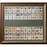 JOHN PLAYER SONS SERIES OF 90 CIGARETTE CARDS WAR DECORATIONS MEDALS IN TWO FRAMES