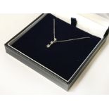 9CT WHITE GOLD NECKLACE WITH 3 DIAMONDS