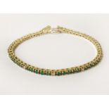 18CT GOLD DIAMOND & EMERALD TENNIS BRACELET