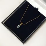9CT GOLD 16'' CHAIN WITH AN AQUAMARINE PENDANT
