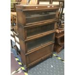 FOUR SECTION GLOBE WERNICK BOOKCASE